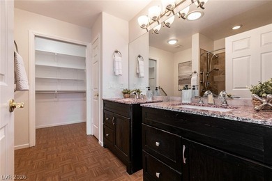 Beautiful single-story end-unit townhome located in a gated