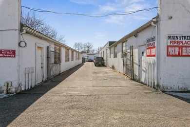 318 East Main Street was constructed 100 years ago. The property - photo 30
