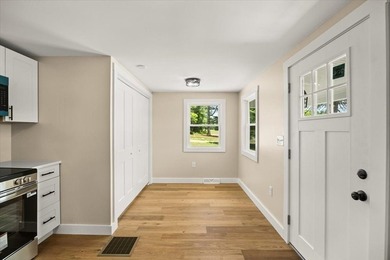 Fully renovated and move-in ready, this charming 2-bedroom home - photo 4