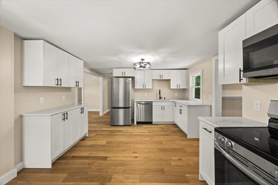 Fully renovated and move-in ready, this charming 2-bedroom home - photo 7