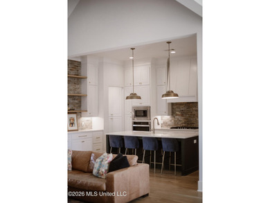 Custom craftsmanship meets modern luxury. Built by the renowned - photo 5