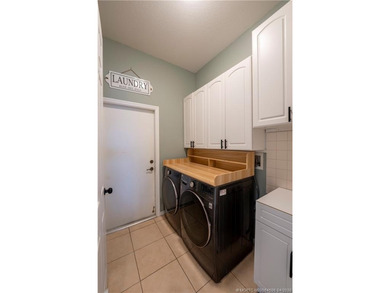 Price improvement! This stunning LAKEFRONT 3BR/2BA/2CG + den - photo 24