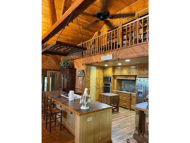Get ready to see this beautiful home built lodge-style with - photo 5