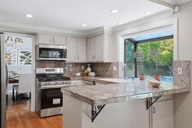PRIZED CORNER LOT WITH STUNNING REMODEL IN SERENE ALMADEN | - photo 11