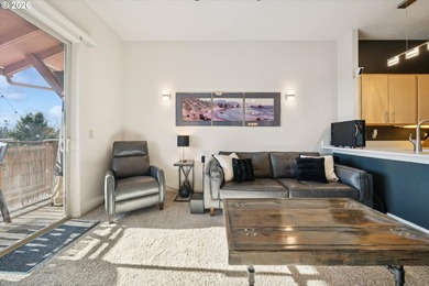 Top-floor, end-unit condo offering added privacy, natural light