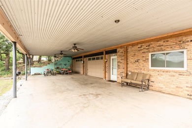 Lakefront Living on Lake Nocona! Escape to this spacious - photo 12