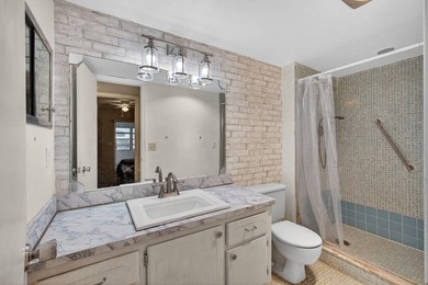 Serene lake views from the balcony highlight this 2/2 floor plan - photo 17