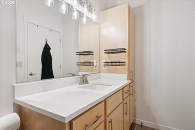 Top-floor, end-unit condo offering added privacy, natural light