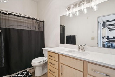 Top-floor, end-unit condo offering added privacy, natural light