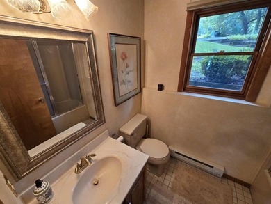 Overlooking Presidents Bay is where you'll find this charming - photo 22