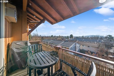 Top-floor, end-unit condo offering added privacy, natural light