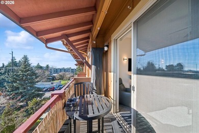 Top-floor, end-unit condo offering added privacy, natural light