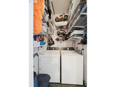 Top-floor, end-unit condo offering added privacy, natural light