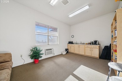 Top-floor, end-unit condo offering added privacy, natural light