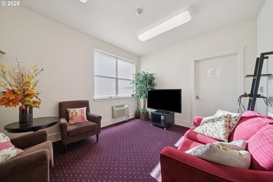 Top-floor, end-unit condo offering added privacy, natural light