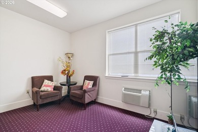 Top-floor, end-unit condo offering added privacy, natural light