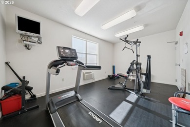 Top-floor, end-unit condo offering added privacy, natural light