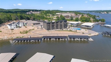 UPSCALE LAKEFRONT CONDO! Discover style with this 2023-built - photo 11