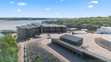 UPSCALE LAKEFRONT CONDO! Discover style with this 2023-built - photo 12
