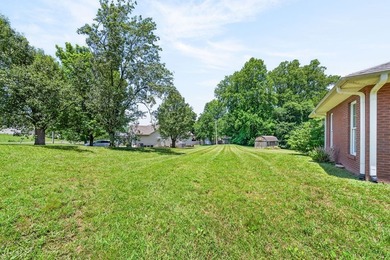 Step inside this beautiful all-brick home featuring 4 spacious - photo 4