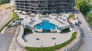 UPSCALE LAKEFRONT CONDO! Discover style with this 2023-built - photo 15