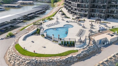 UPSCALE LAKEFRONT CONDO! Discover style with this 2023-built - photo 16