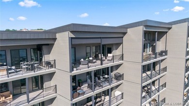 UPSCALE LAKEFRONT CONDO! Discover style with this 2023-built - photo 18