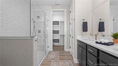 UPSCALE LAKEFRONT CONDO! Discover style with this 2023-built - photo 19