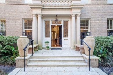 Situated on Vetsburg Park, this iconic home w/ grand entrance & - photo 2