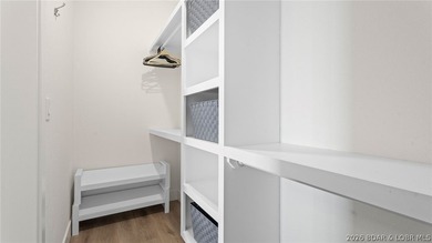 UPSCALE LAKEFRONT CONDO! Discover style with this 2023-built - photo 23