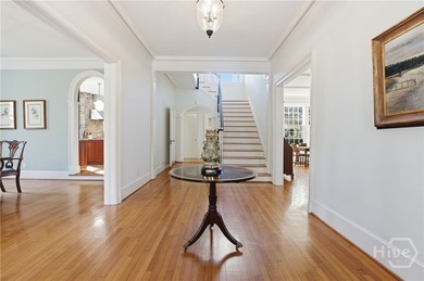 Situated on Vetsburg Park, this iconic home w/ grand entrance & - photo 3