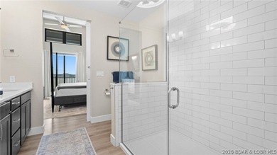 UPSCALE LAKEFRONT CONDO! Discover style with this 2023-built - photo 25