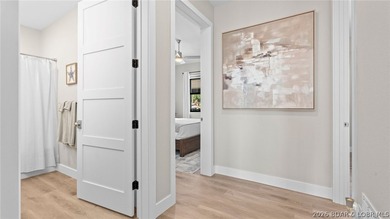 UPSCALE LAKEFRONT CONDO! Discover style with this 2023-built - photo 27
