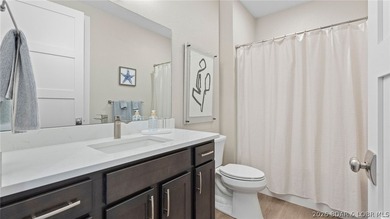 UPSCALE LAKEFRONT CONDO! Discover style with this 2023-built - photo 28