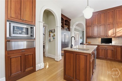 Situated on Vetsburg Park, this iconic home w/ grand entrance & - photo 8
