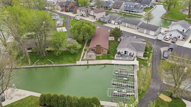 LAKEFRONT!!! Escape to the water in this 2 bedroom, 2 bath - photo 1