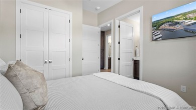 UPSCALE LAKEFRONT CONDO! Discover style with this 2023-built - photo 34