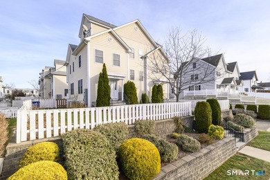 Welcome to this rare 3 bedroom, 3.5 bath townhouse! Located in a - photo 1