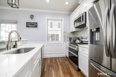 Welcome to this rare 3 bedroom, 3.5 bath townhouse! Located in a - photo 10
