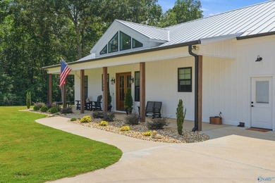 Private riverfront retreat on 10 acres along beautiful Bluewater - photo 29