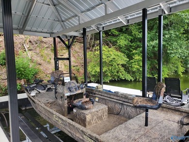 Private riverfront retreat on 10 acres along beautiful Bluewater - photo 34