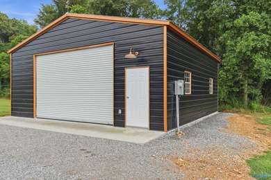 Private riverfront retreat on 10 acres along beautiful Bluewater - photo 35
