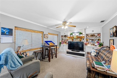 Tucked away on beautiful Lake Weir, this charming gated - photo 15