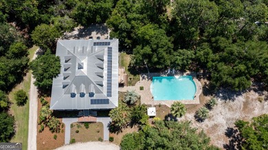 A truly one-of-a-kind waterfront estate, privately situated on 4 - photo 17