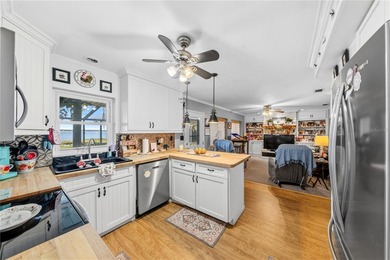 Tucked away on beautiful Lake Weir, this charming gated - photo 25