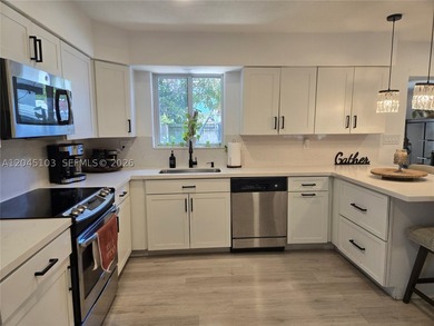 Substantially remodeled and move-in ready, this single-story - photo 1