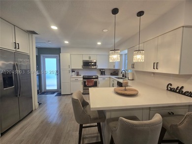 Substantially remodeled and move-in ready, this single-story - photo 4