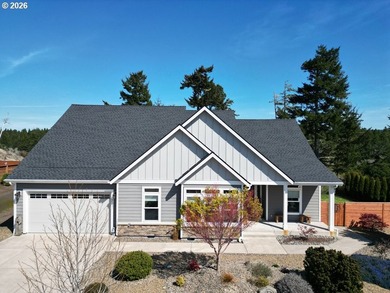 Nestled in the desirable Reserve at Heceta Lake community, this - photo 1