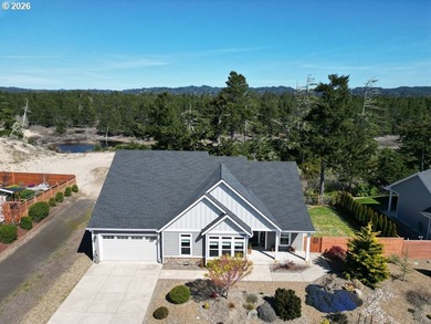 Nestled in the desirable Reserve at Heceta Lake community, this - photo 2