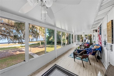Tucked away on beautiful Lake Weir, this charming gated - photo 43